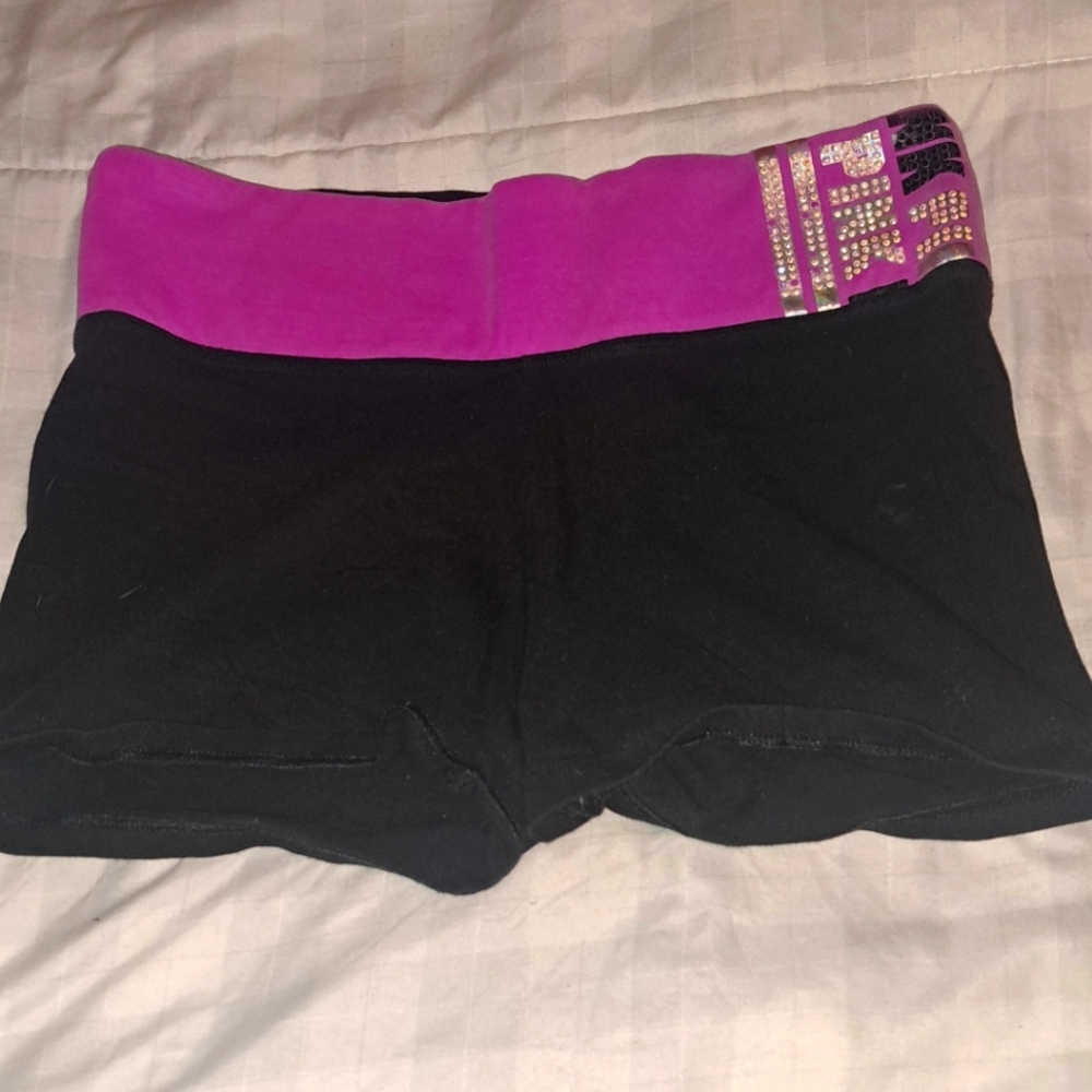Pink yoga shorts size medium. Fuschia band with bling embellishment.